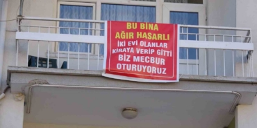 agir-hasarli-pankarti-asilan-binayi-gorenler-bir-daha-bakiyor-5sMd9UgI.jpg